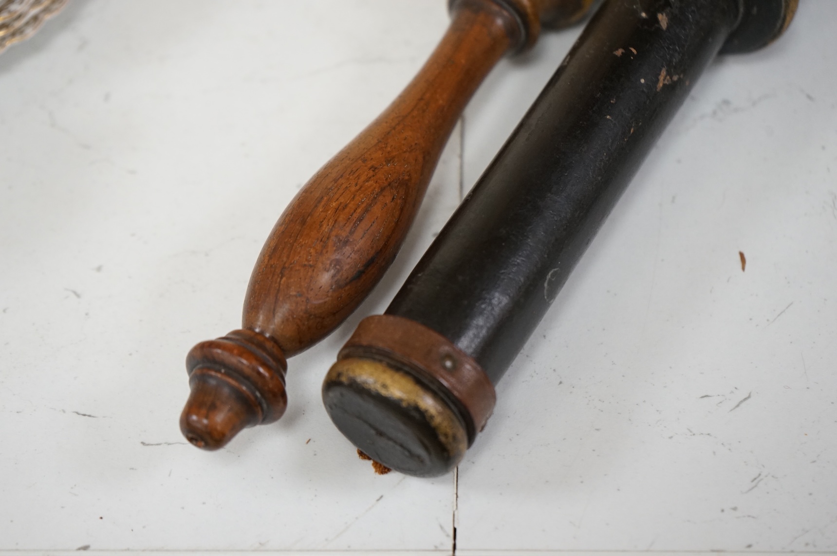 Two Victorian turned and painted wood tipstaffs, each painted with the Royal cypher, one inscribed ‘York’, largest 33cm in length